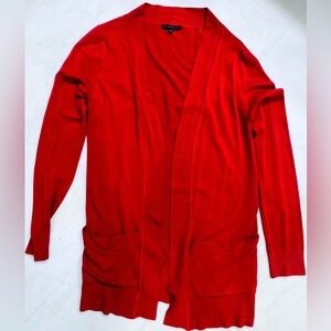 Staccato open front, long sleeve 2 pocket cardigan. Size Large